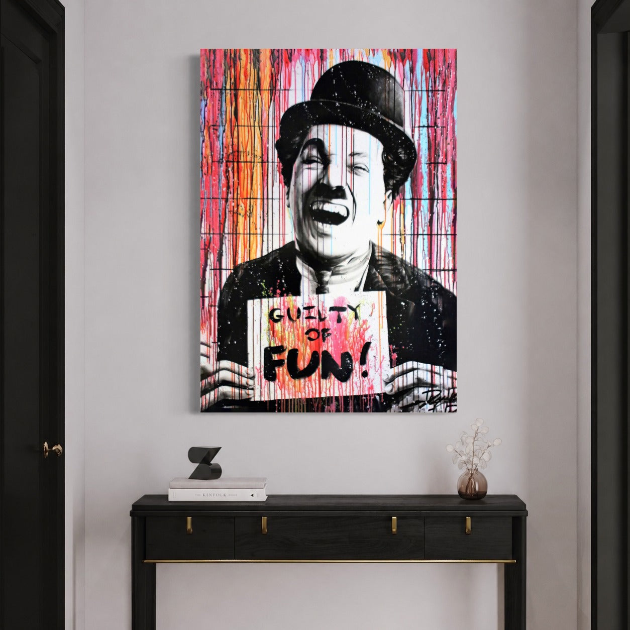 Charlie Chaplin. — sur le mur